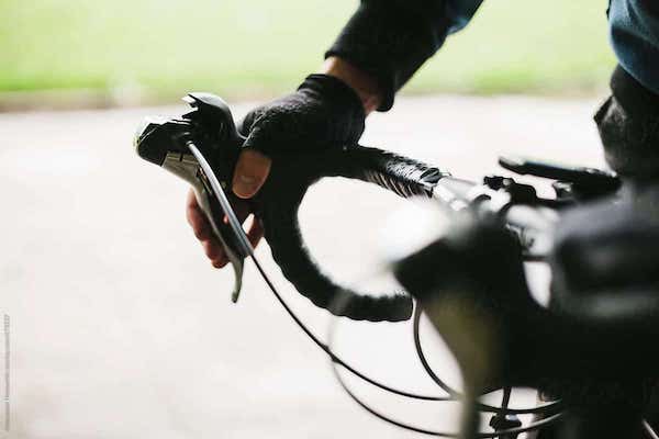 Biker pulling the breaks on a bike